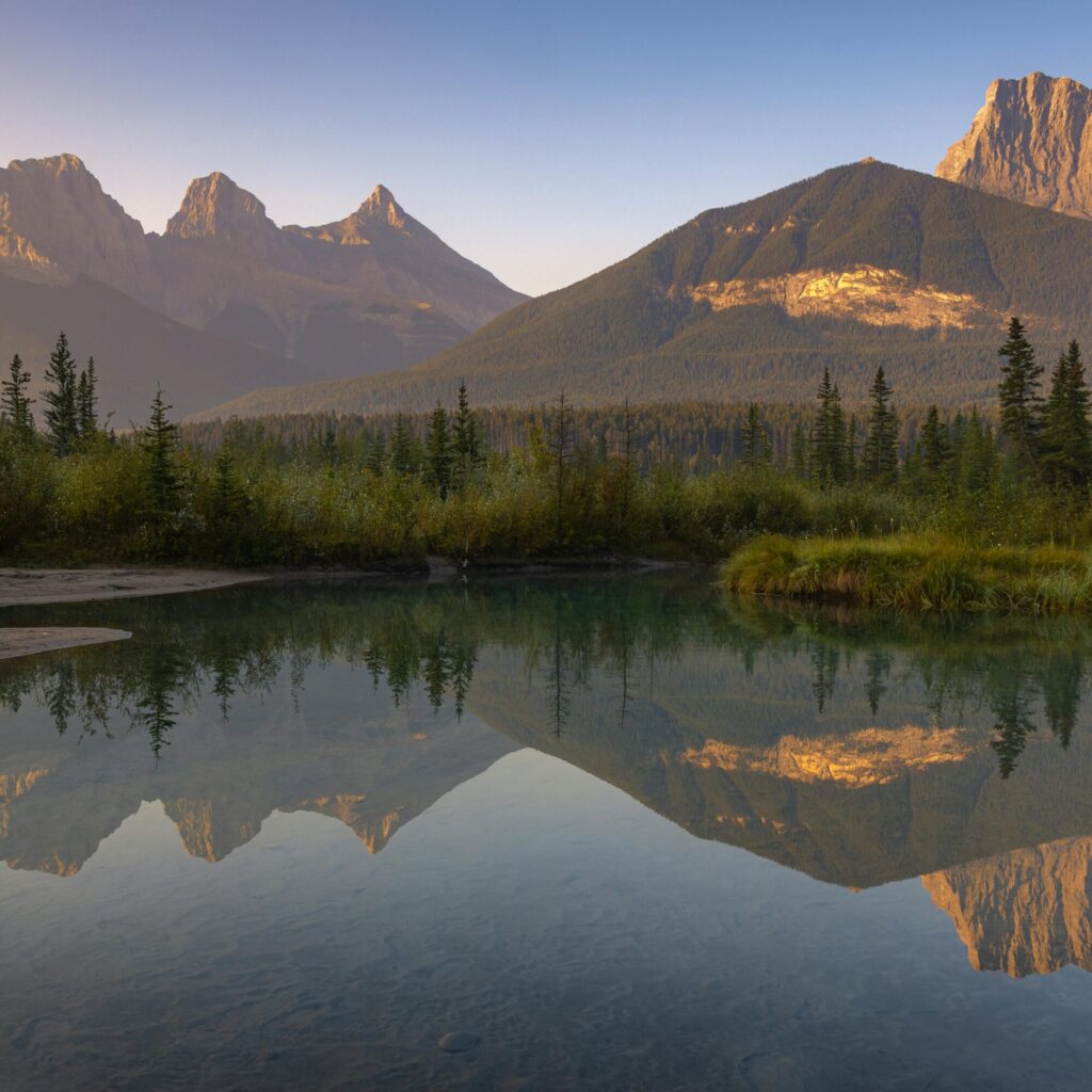 Photo of the sunset at Three Sisters in Alberta